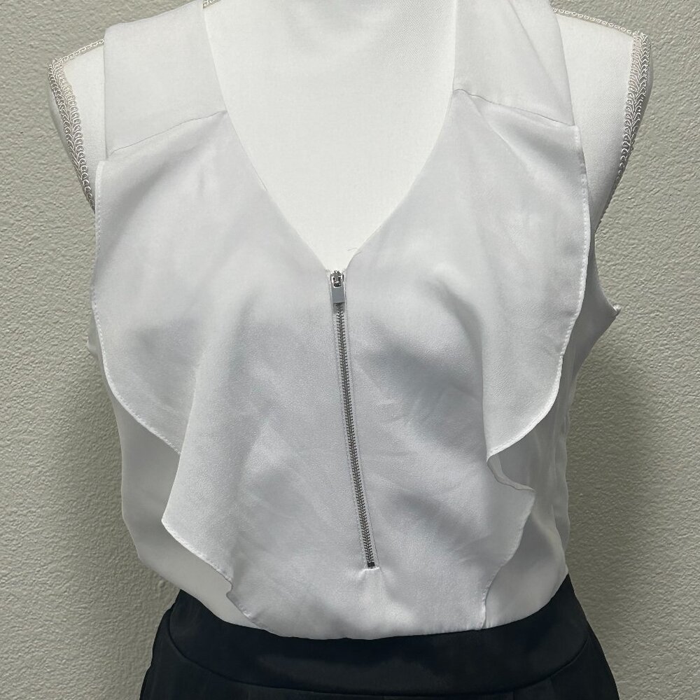 Express black and white one piece lined shorts romper, ruffled top, size 6